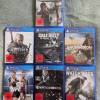 7 PS4 Spiele Witcher 3, CoD, Tomb Raider etc.