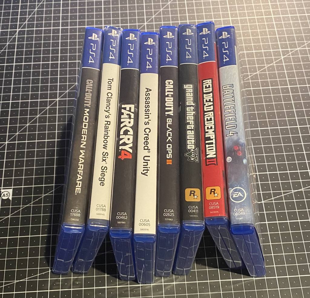 PS4 Spielepaket 8er Set (GTA, RDR2, BF4...)