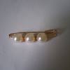 Sch�ne Haarspange in Beige und Goldfarbend